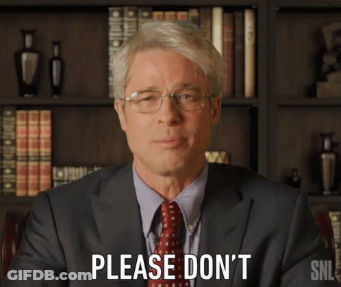 Man In Suit Saying Please Don't In Front Of Bookshelf GIF