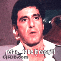 Man In Suit Saying Relax Take It Easy GIF