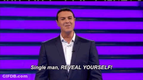 Man In Suit Saying Reveal Yourself GIF