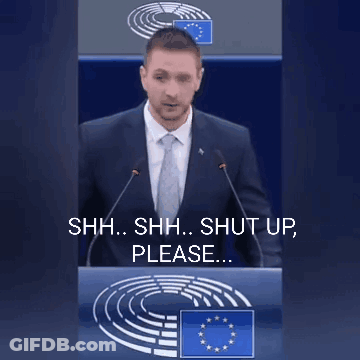 Man In Suit Saying Shh Shh Shut Up Please GIF