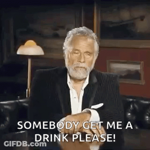 Man In Suit Saying Somebody Get Me A Drink Please GIF