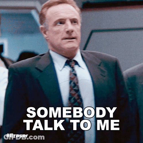 Man In Suit Saying Somebody Talk To Me GIF