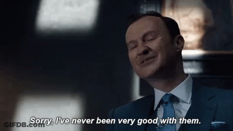 Man In Suit Saying Sorry I've Never Been Very Good With Them GIF