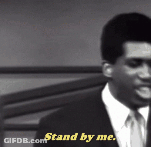Man In Suit Saying Stand By Me In Yellow GIF