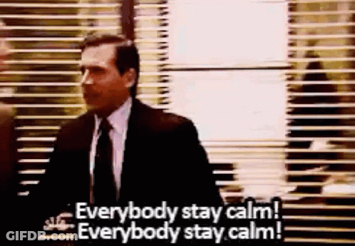 Man In Suit Saying Stay Calm GIF