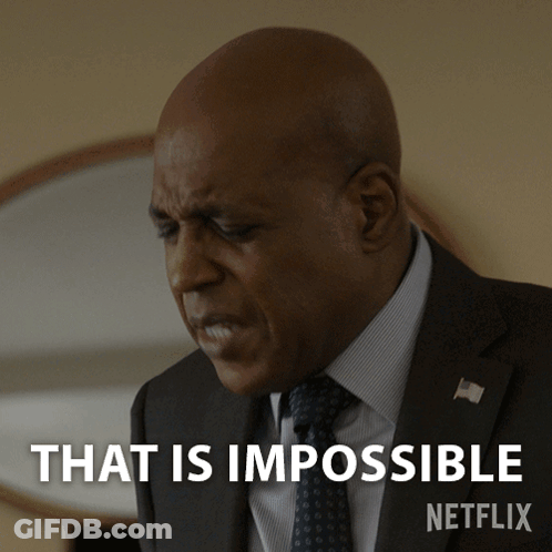 Man In Suit Saying That Is Impossible GIF