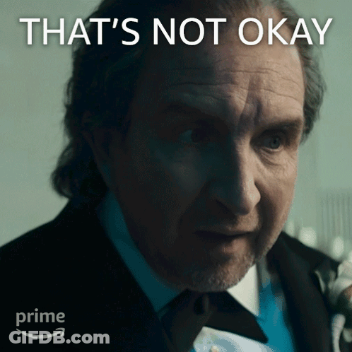 Man In Suit Saying That's Not Okay GIF