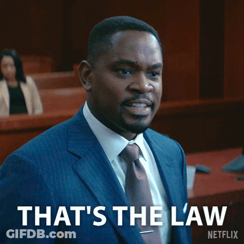 Man In Suit Saying That's The Law GIF
