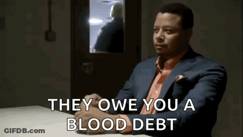 Man In Suit Saying They Owe You A Blood Debt GIF