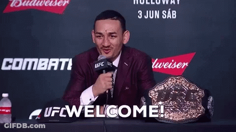 Man In Suit Saying UFC Welcome GIF
