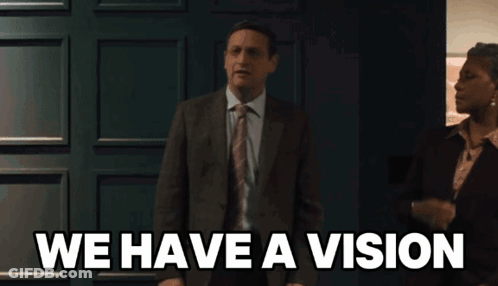 Man In Suit Saying We Have A Vision GIF
