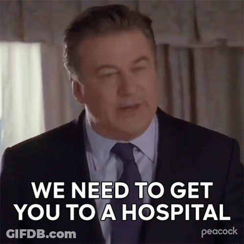 Man In Suit Saying We Need To Get You To A Hospital GIF