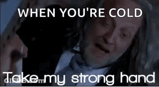 Man In Suit Saying When You're Cold Take My Strong Hand GIF