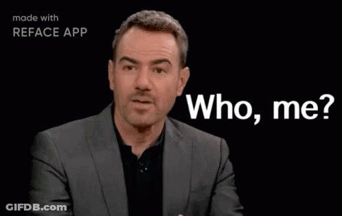 Man In Suit Saying Who Me GIF