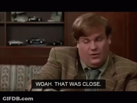 Man In Suit Saying Woah That Was Close GIF