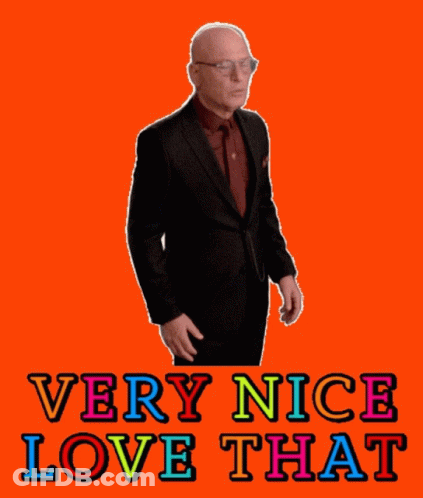 Man In Suit Saying Wow Very Nice Love That On Orange GIF