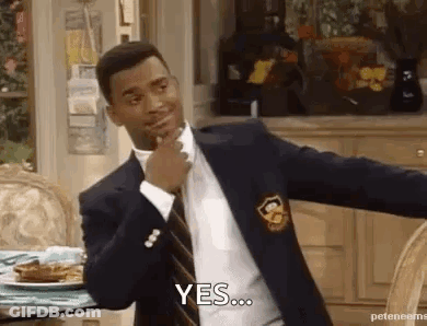 Man In Suit Saying Yes At Table GIF