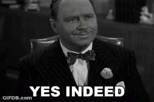Man In Suit Saying Yes Indeed GIF