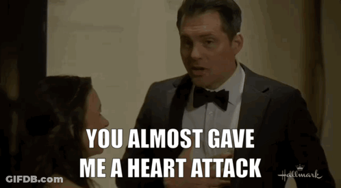 Man In Suit Saying You Almost Gave Me A Heart Attack GIF