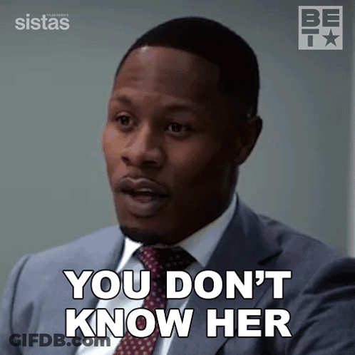Man In Suit Saying You Don't Know Her GIF
