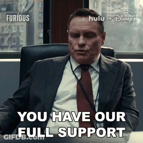 Man In Suit Saying You Have Our Full Support GIF