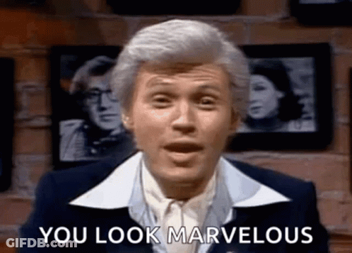 Man In Suit Saying You Look Marvelous GIF