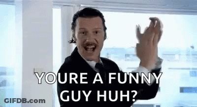 Man In Suit Saying You're A Funny Guy Huh GIF