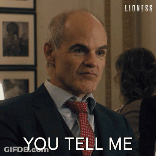 Man In Suit Saying You Tell Me GIF