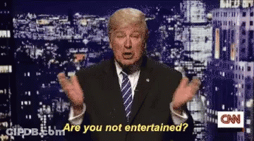 Man In Suit Says Are You Not Entertained GIF