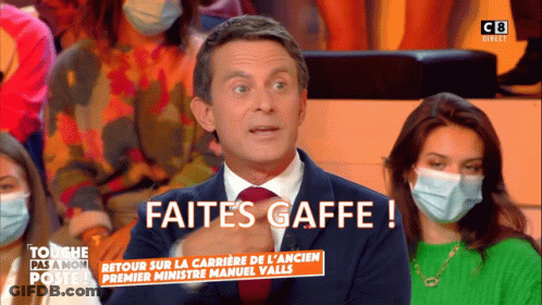 Man In Suit Says Faites Gaffe On Screen GIF