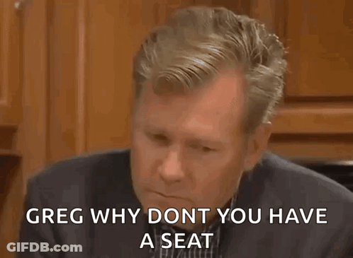 Man In Suit Says Greg Why Dont Have Seat GIF