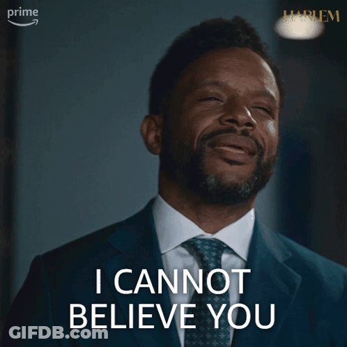 Man In Suit Says He Cannot Believe You GIF