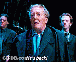 Man In Suit Says He's Back To Two Men GIF