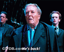 Man In Suit Says He's Back To Two Men GIF