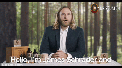 Man In Suit Says Hello I'm James Schrader Dr. Squatch Background GIF