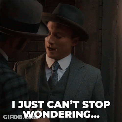 Man In Suit Says I Can't Stop Wondering GIF
