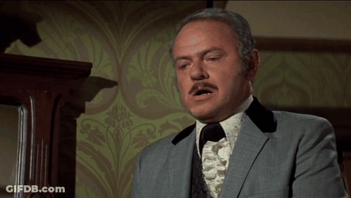 Man In Suit Says I Love It When You Talk Dirty GIF