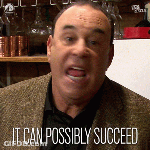 Man In Suit Says It Can Possibly Succeed In Front Of Bar Rescue Sign GIF