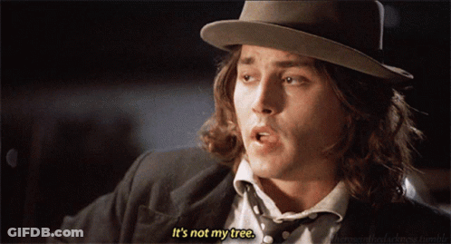 Man In Suit Says It's Not My Tree GIF