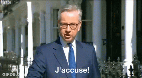 Man In Suit Says J'Accuse GIF