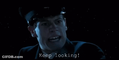 Man In Suit Says Keep Looking In The Dark GIF