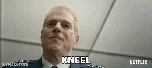 Man In Suit Says Kneel Netflix Advertisement GIF