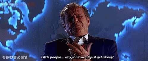 Man In Suit Says Little People Why Can't We All Just Get Along GIF