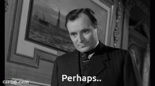 Man In Suit Says Perhaps Black And White GIF