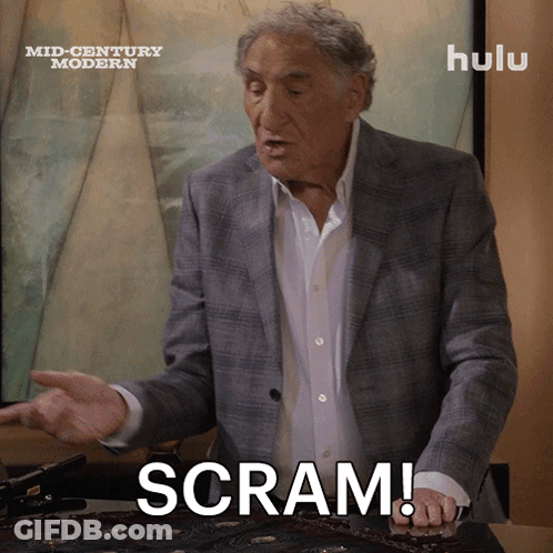 Man In Suit Says Scram At Hulu Sign GIF