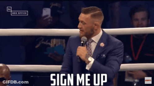 Man In Suit Says Sign Me Up In Boxing Ring GIF