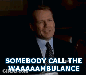 Man In Suit Says Somebody Call The Waaambulance GIF