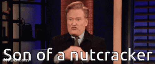 Man In Suit Says Son Of A Nutcracker GIF