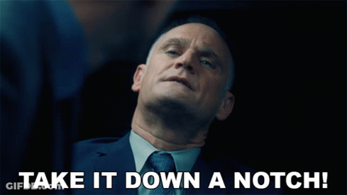 Man In Suit Says Take It Down A Notch GIF