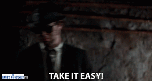 Man In Suit Says Take It Easy Blues Brothers Sign GIF